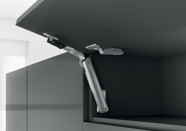 Prostý zdvihač malého výklopu AVENTOS HK-XS se harmonicky začlení do vnitřku nábytku